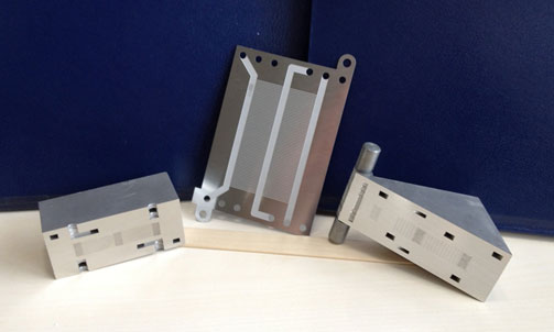 Sections and shim of a half-height micro-channel heat exchanger prototype from the first iteration (WP2).